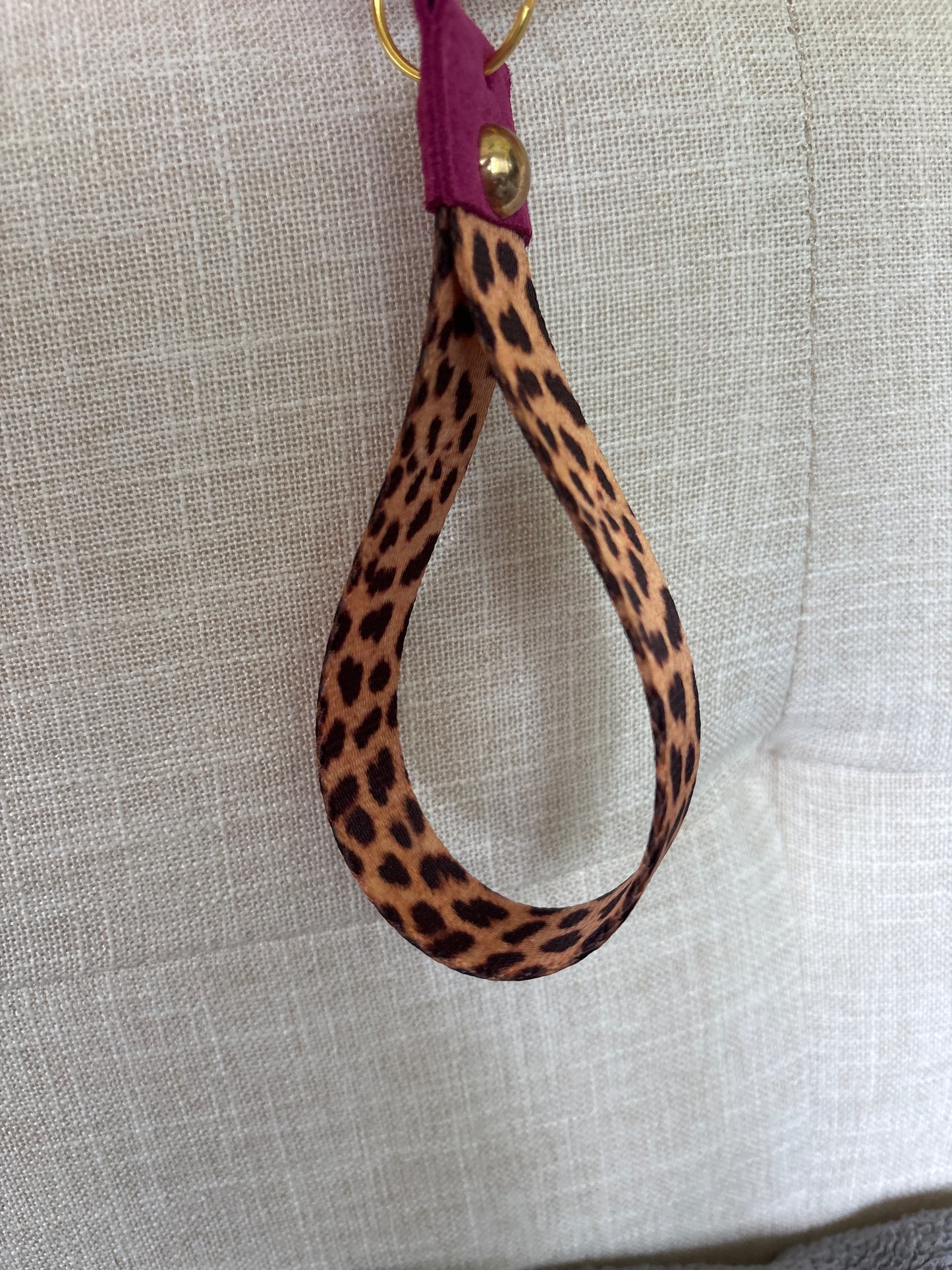 Key Chain Cheetah print wrist strap with fuchsia suede and gold dome rivet and key ring - DMD Bags