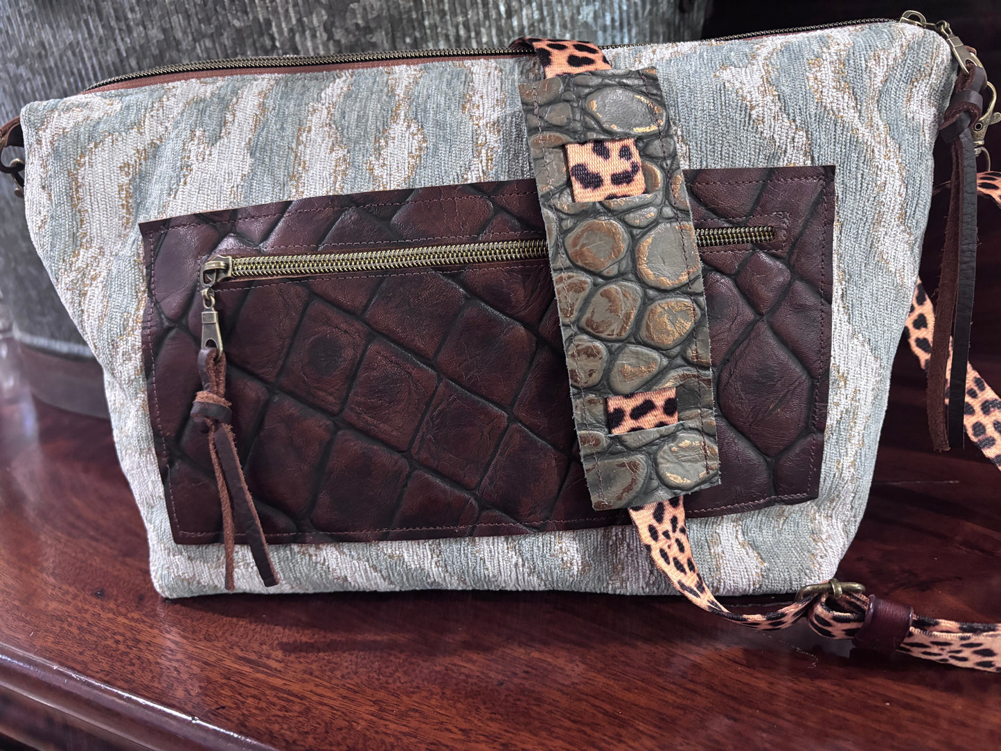Adjustable strap, front and back pockets, interior pocket, One of a kind. - DMD Bags