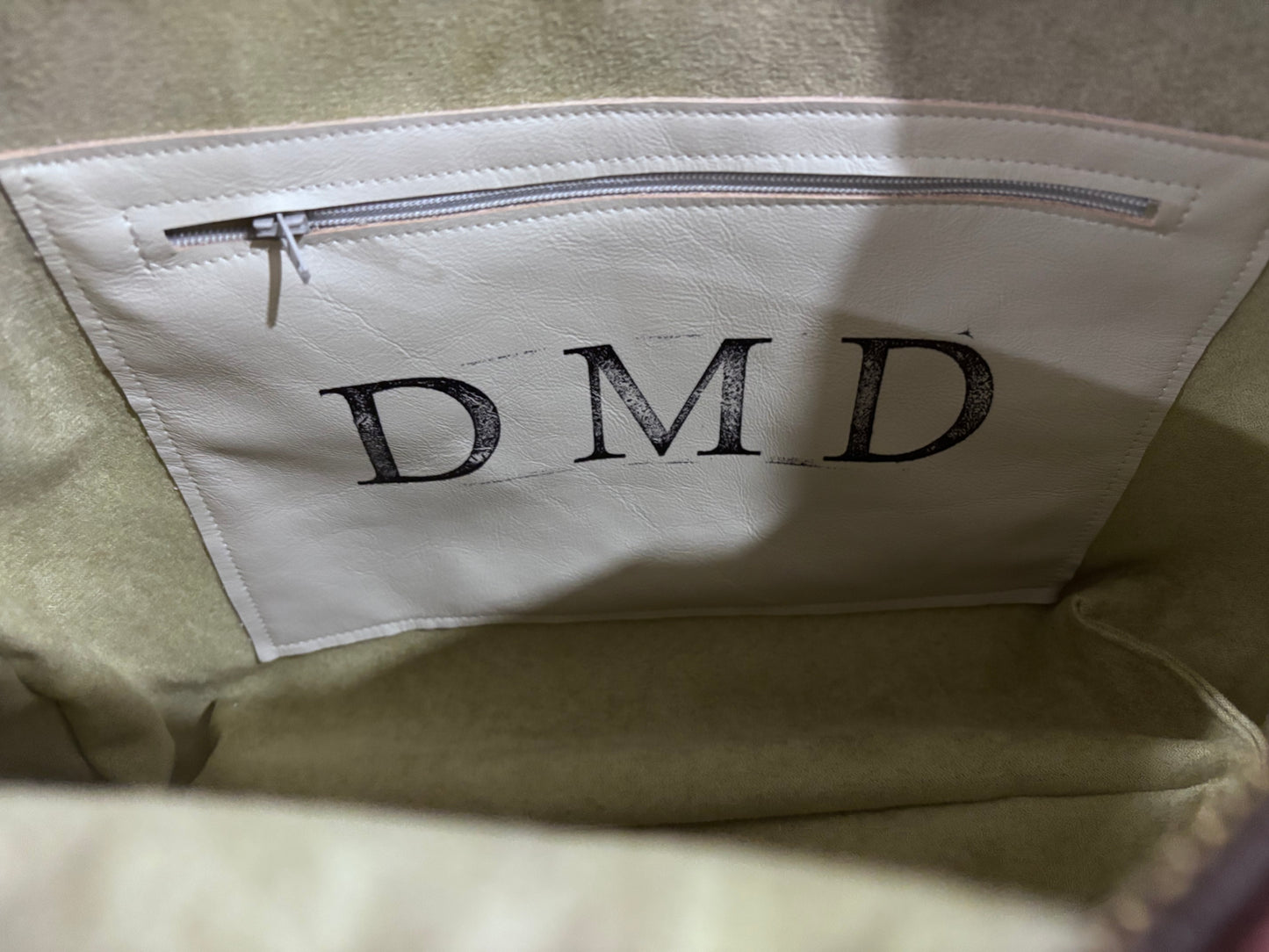Adjustable strap, front and back pockets, interior pocket, One of a kind. - DMD Bags