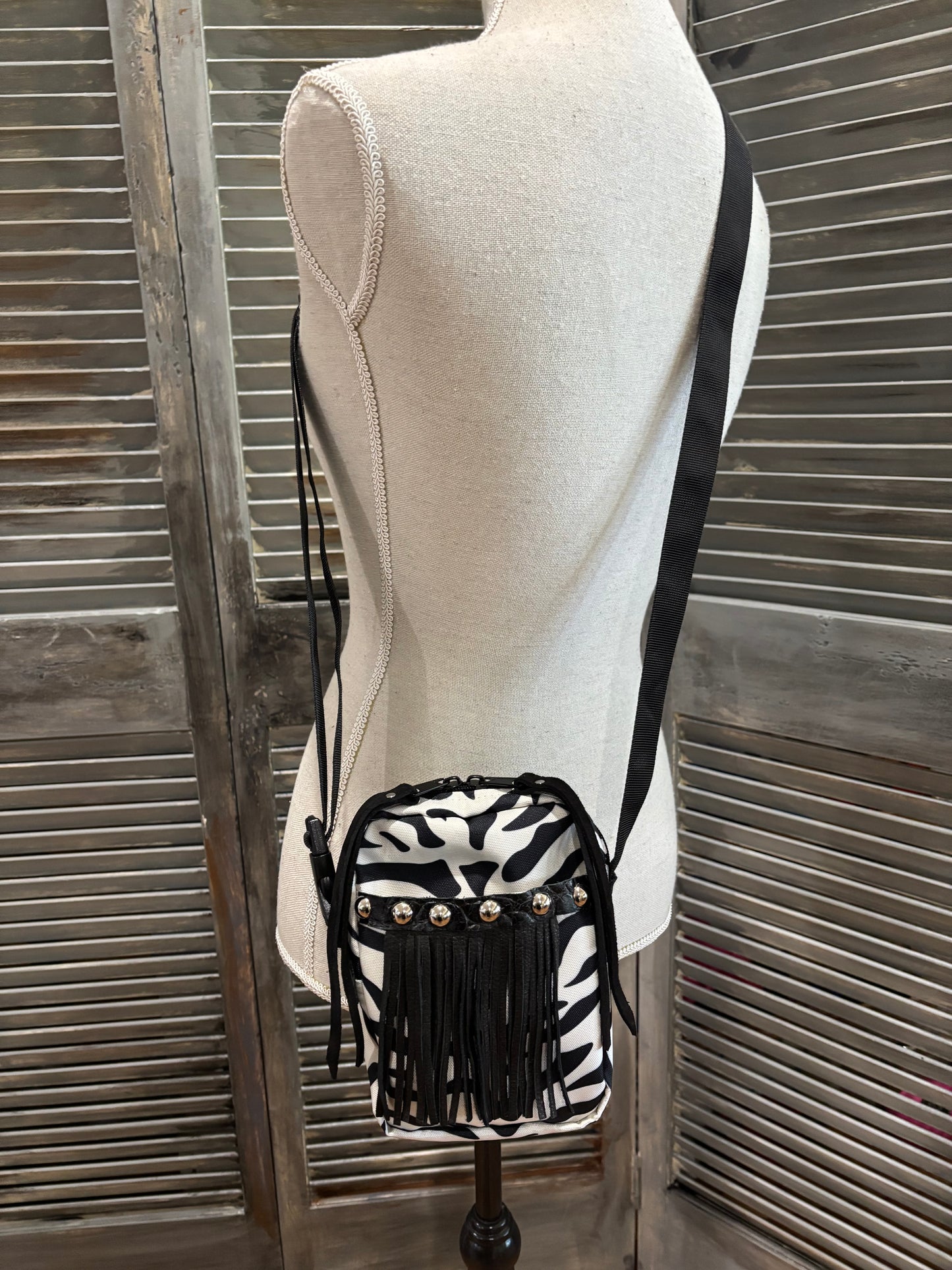 The X Bag, Rocker! Black and cream zebra silver studs, black leather fringe
