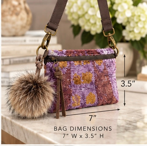 Furry Pom Pom with leather tie