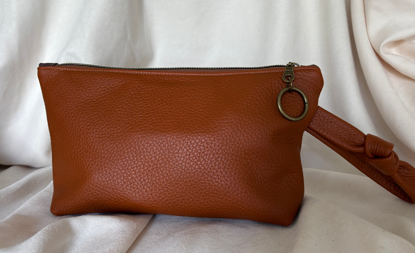 Knotted Strap Camel Leather Wristlet Logo Pocket