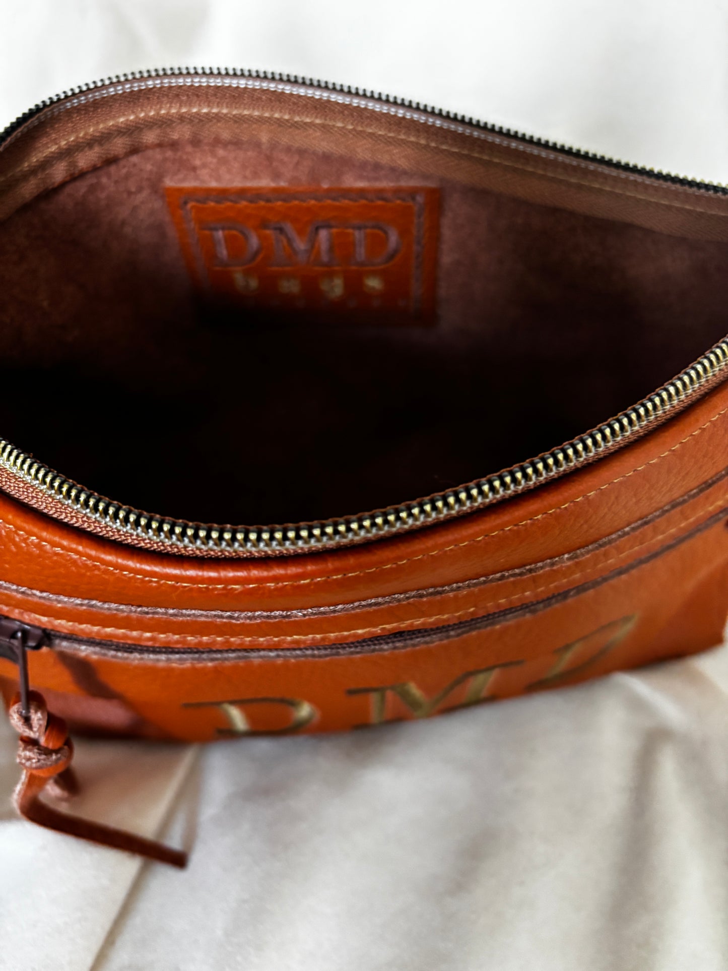 Knotted Strap Camel Leather Wristlet Logo Pocket