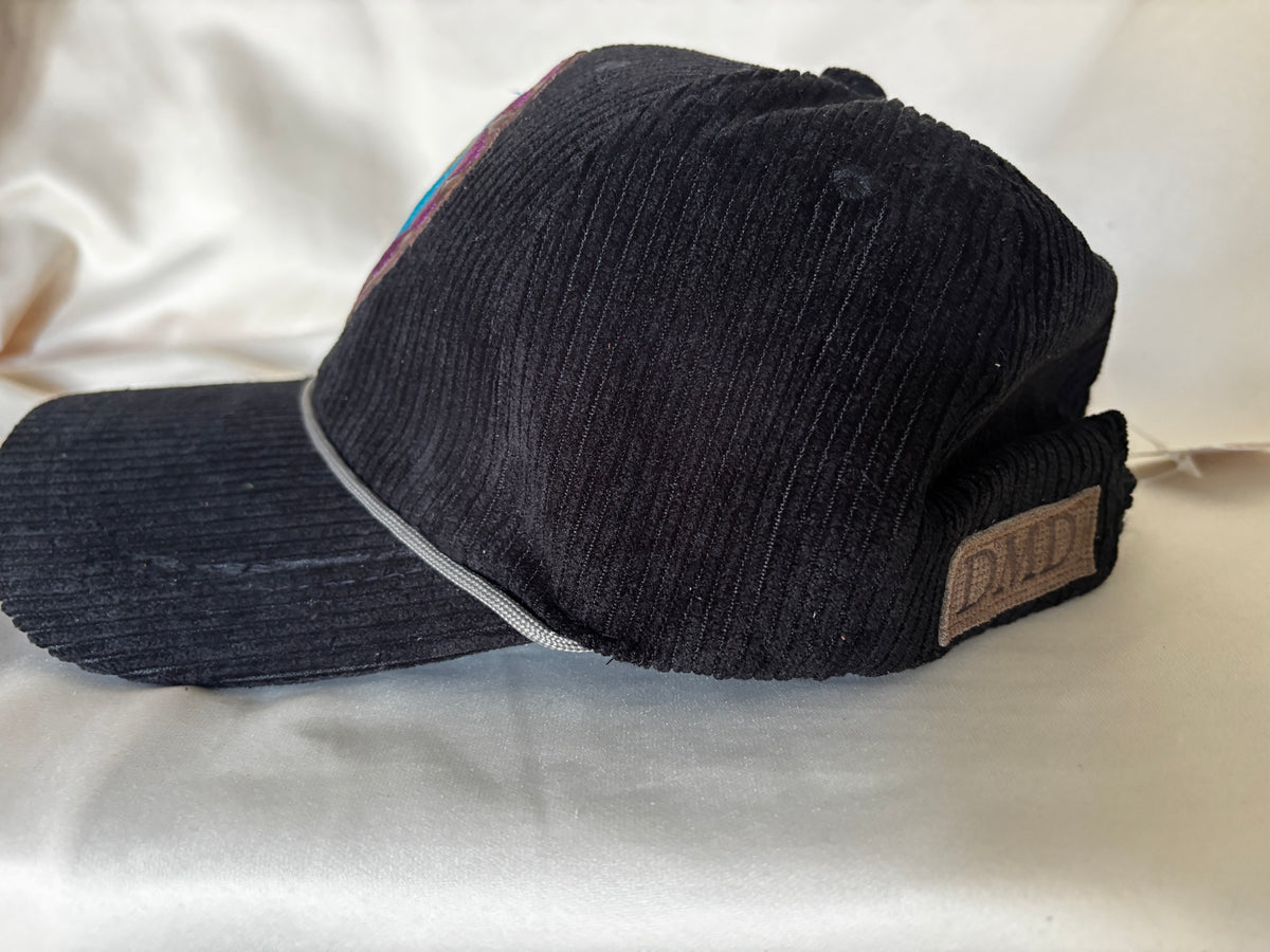 Corduroy Ball Cap in Black with Embroidered Medallion with Rope detail