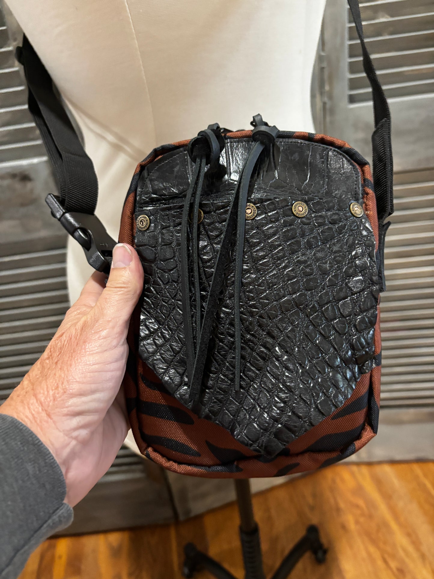 The X Bag in Brown Tiger stripe with genuine alligator