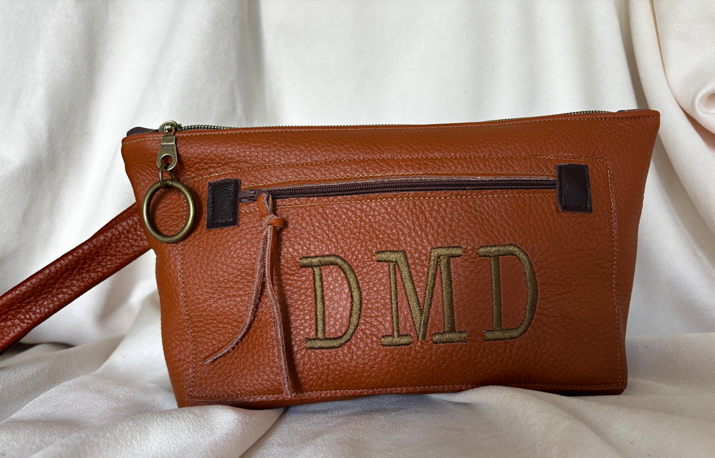Knotted Strap Camel Leather Wristlet Logo Pocket