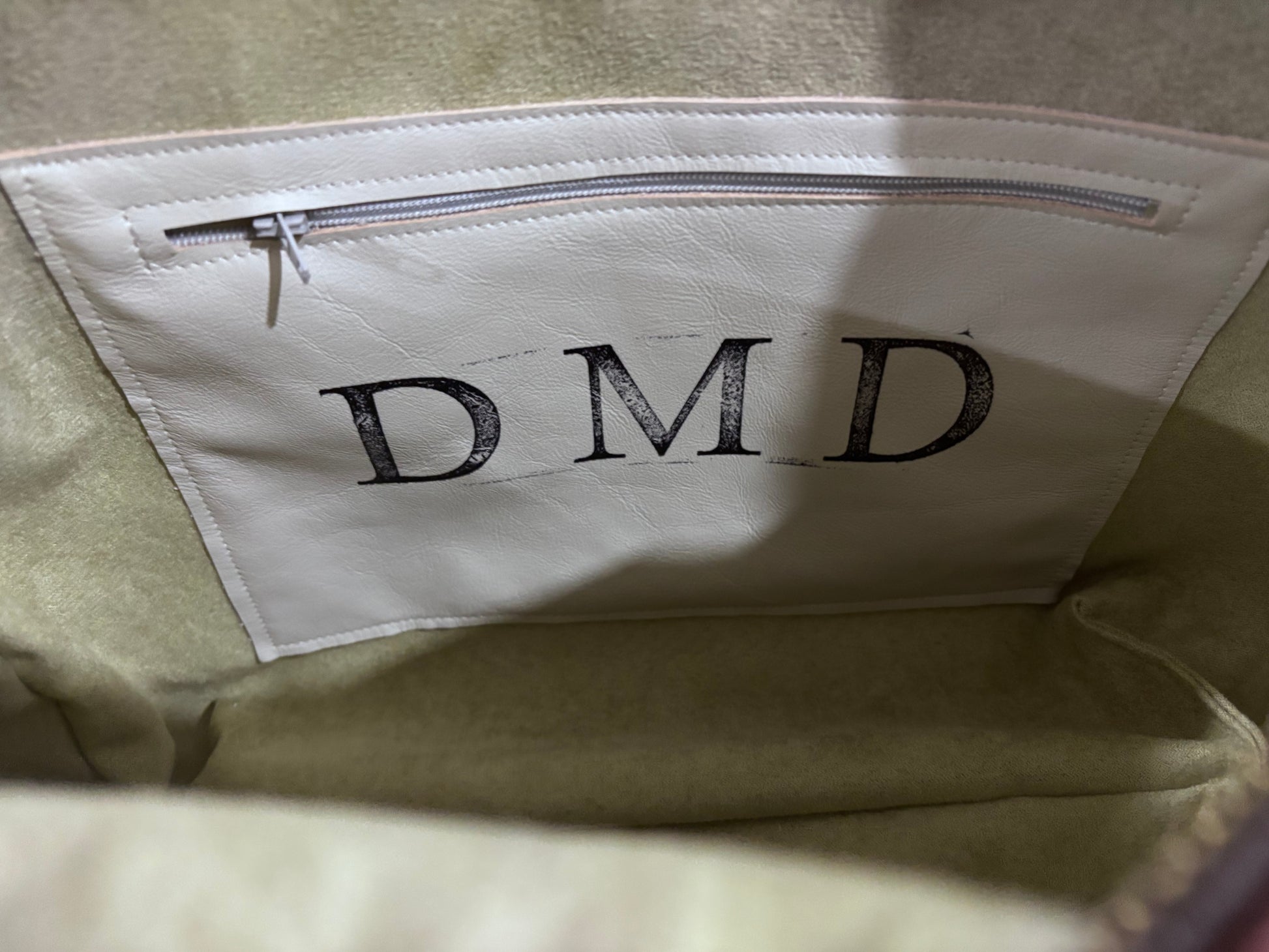 Adjustable strap, front and back pockets, interior pocket, One of a kind. - DMD Bags