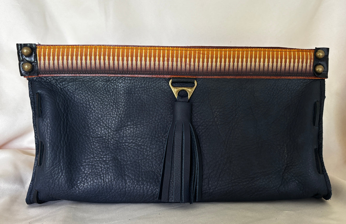 Leather Clutch in Navy & Caramel Abstract Trim & Tassel
